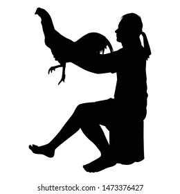 Young man with his fighting chicken silhouette vector