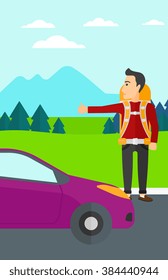 Un joven haciendo autostop.