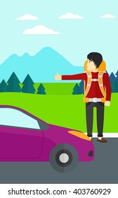 Young man hitchhiking.