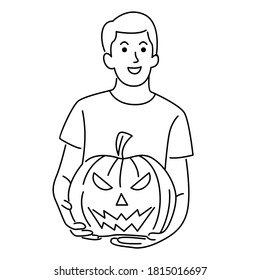 Young man hold halloween pumpkin head