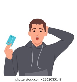 Young man holding credit card stressed with hand on head, shocked with shame and surprise face. Flat vector illustration isolated on white background