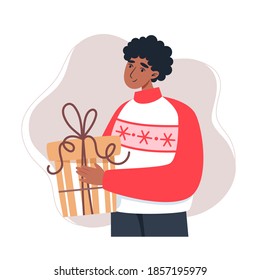 Young man holding a gift, vector illustration in flat style