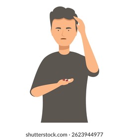 Young man is holding a pill and suffering from a headache