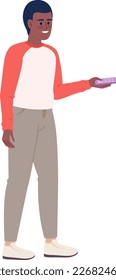 Young man holding remote controller semi flat color vector character. Editable figure. Full body person on white. Simple cartoon style spot illustration for web graphic design and animation