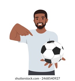 Young man holds out hand with soccer ball and points finger at it. Flat vector illustration isolated on white background