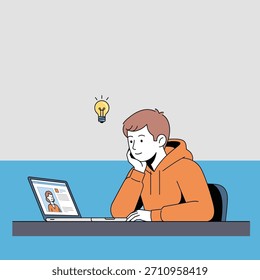 Young man with an idea is working on his laptop, smiling and looking inspired, possibly engaged in online education, remote work, or creative problem-solving.