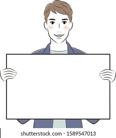 Young man in jacket is holding a white board