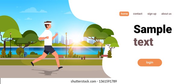 young man jogging outdoors modern public park guy in headphones running sport activity concept cityscape sunset background horizontal banner copy space