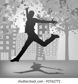 Young man jumping against spray paint elements.