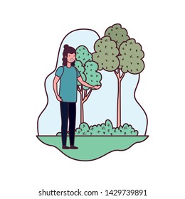 young man in landscape with trees and plants