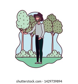 young man in landscape with trees and plants