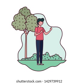 young man in landscape with trees and plants