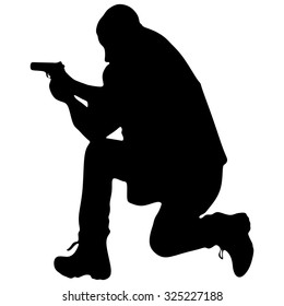 young man in leather jacket holding a gun