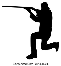young man in leather jacket holding a rifle
