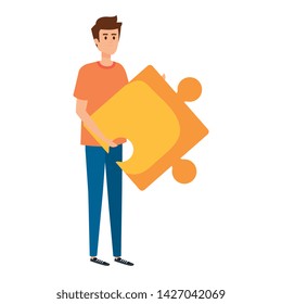 young man lifting puzzle game piece