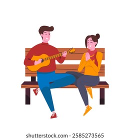 A Young Man in Love Sitting on a Park Bench Is Playing Guitar for His Girlfriend. Happy Romantic Couple