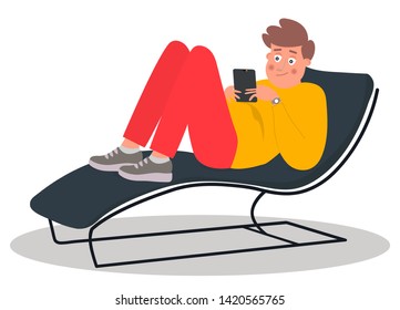 Young man lying on the couch. Young man scrolls through the news feed on his tablet. Vector illustration