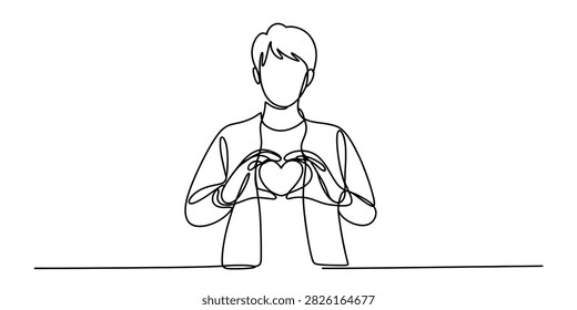 Young man making heart