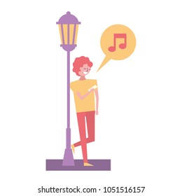 young man with mobile music speech bubble standing near lamp post