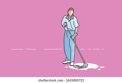 Young Man mopping up spill