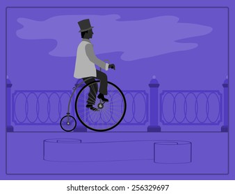 Young man on a retro bicycle Young man riding a retro bicycle along the waterfront. 
