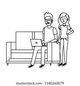 young man on the sofa with laptop and girl