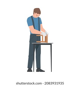 Young Man in Overall Assembling and Installing Wooden Furniture Vector Illustration