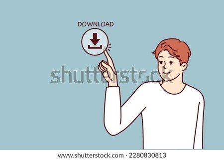 Young man presses download button on screen for concept of web content consumption and network use. Guy downloads information from Internet using cloud storage or torrent clients with media files