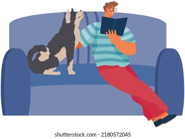 Young man reading book and petting dog on cofa. Smiling male character having rest with puppy at home. Guy with cute pet, domestic animal spending time on couch. Relax, leisure or education concept