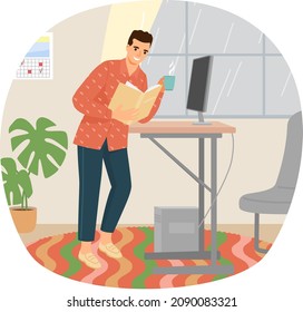Young man reading book standing near table with computer in living room, studying at home. Guy student is resting with book, male character is fond of literature, enjoys reading, gets education
