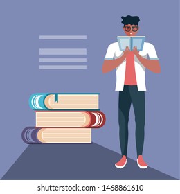 young man reading with stack of books