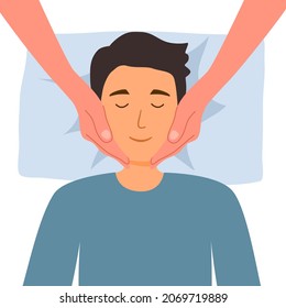 Young man receiving a relaxation head massage in a spa center. 