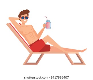 young man relaxing in beach chair drinking juice fruit