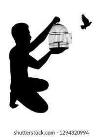 Young man release a bird from cage to freedom silhouette vector