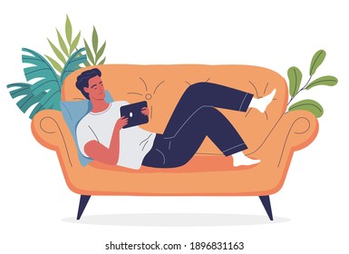 Young man resting on his yellow sofa