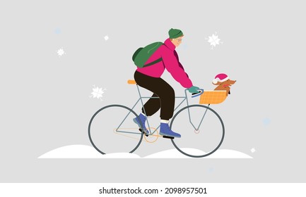 Young man rides a bicycle under snow fall in winter in warm clothing with a dog as a passenger. Flat vector illustration