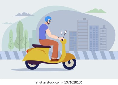 Young man rides a scooter in a city