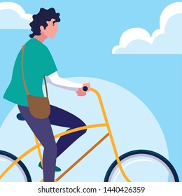 young man riding bike with sky and clouds