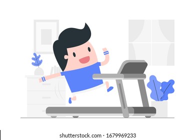 Young man running on a treadmill at home. 