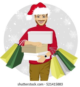 young man in santa hat walking with shopping bags and boxes - christmas, sale, discount and holidays concept