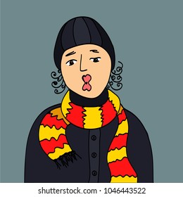 Young man in a scarf on a gray background