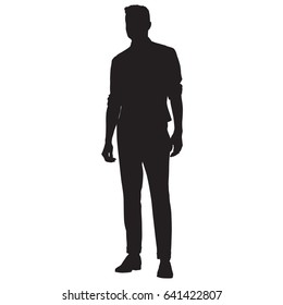 Young man in shirt, vest and pants standing, vector silhouette