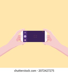 A young man is shooting a video using his smartphone.
Illustration about Record video with smartphone.
