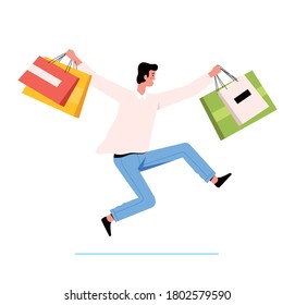 Young man shopping holds packages from the store in his hands and jumps happily. The concept of a successful purchase and the joy of discounts