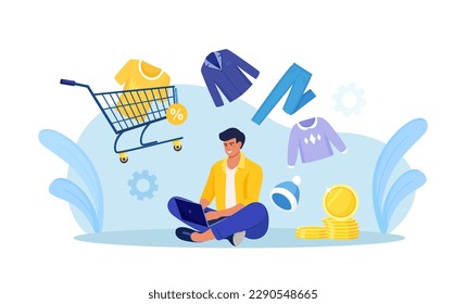 Young man shopping online using laptop, pay with mobile app. Customer choosing modern apparel, wearing, accessories for wardrobe. Internet garment shop, sale. Shopping cart, trolley with garments