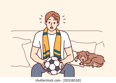 Young man sit on couch watching football game at home. Male sport fan with ball in hands enjoy match indoors. Vector illustration. 