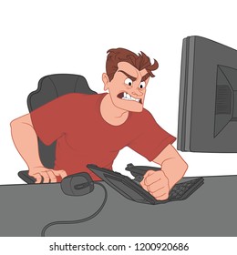 A young man sits at a computer and breaks the keyboard in anger