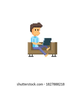 A young man sits on the couch and works with a laptop. Pixel art icon. Old school computer graphic. 8 bit video game. 