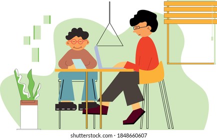 Ein junger Mann sitzt am Tisch und arbeitet mit seinem Sohn. Ein kleiner Junge sitzt bei seinem Papa.