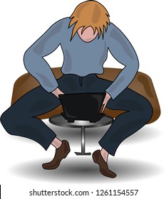 A young man sits and works at a laptop in a chair. He is a geek, working as a system administrator in an office. In front of him on the table is a laptop.He is a professional in his field. 